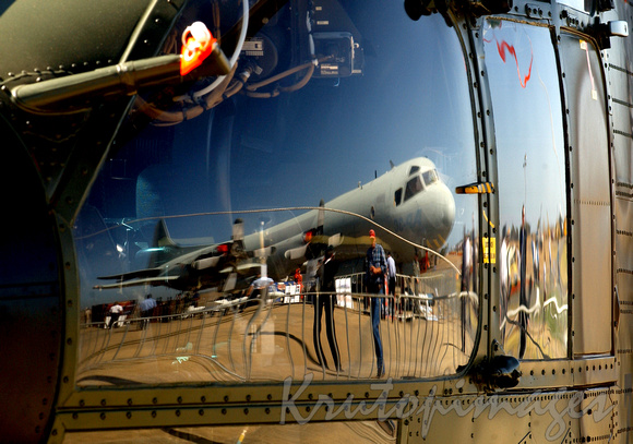 Airshow reflection in the cockpit helicopter window