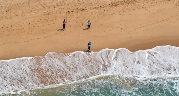 Aerial shoreline with people