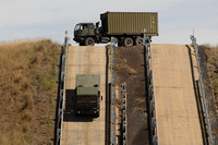 army transport vehicles go through trials at testing grounds in Monageeta-5