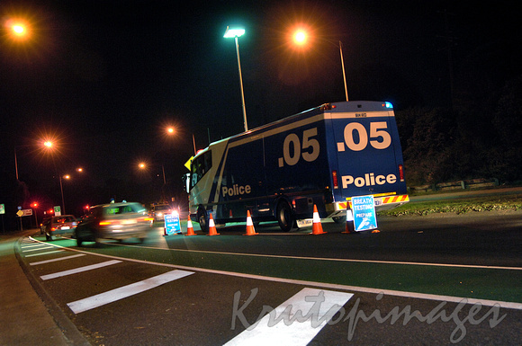Booze Bus -Random breath test police vehicle on a major road at night-Melbourne-2