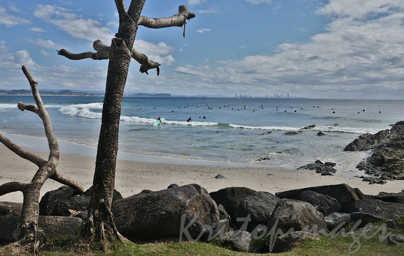 Snapper Rocks-on the Gold Coast with surfers and Surfers Paradise on the horizon