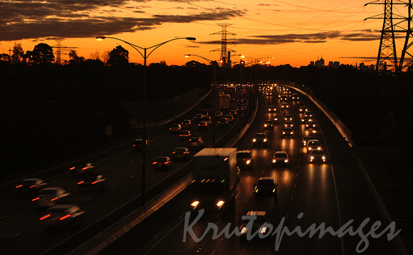 Freeway traffic heading out of the city at sunset Melbourne