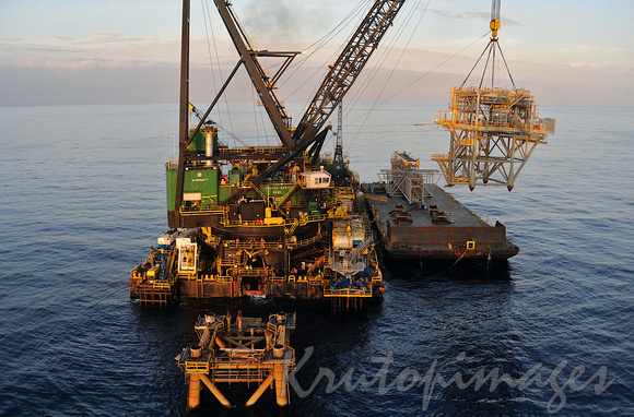 The RAT or Riser Access Truss is lifted from a barge offshore-Bass Strait-4