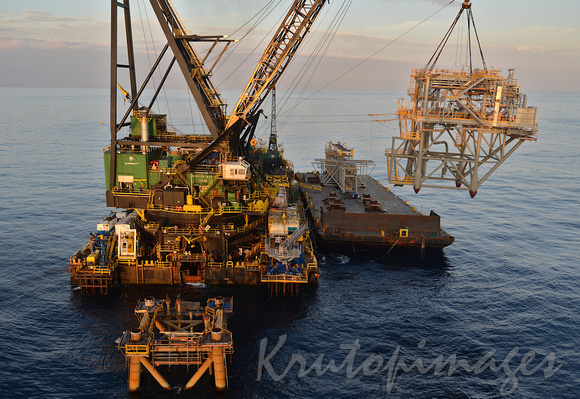The RAT or Riser Access Truss is lifted from a barge offshore-Bass Strait-3