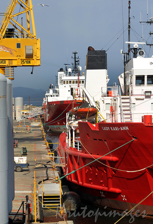 Barry Beach Marine Terminal showing work boats and industrial crane at dockside