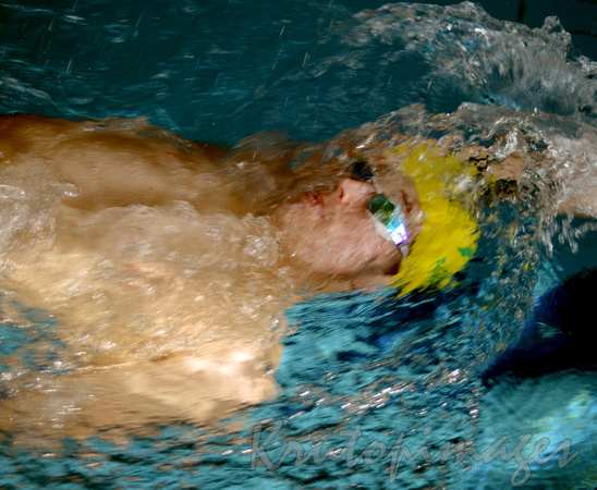 Australian swimmer in motion with blur effect