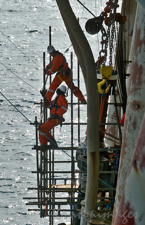 Offshore riggers-roughnecks working on maintenance of a Bass Strait platform