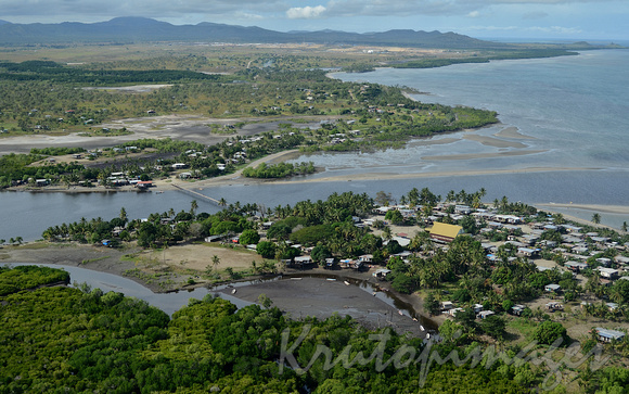 Png-small village with crossover bridge on the delta lands Papua New Guinea