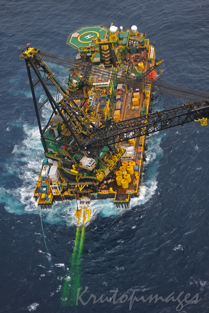 Aerial view of the DB30 a derrick barge preparing to launch siesmic floats to record geographic undersea location prior to drilling