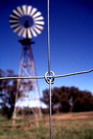 steel fencing and windmill on farm