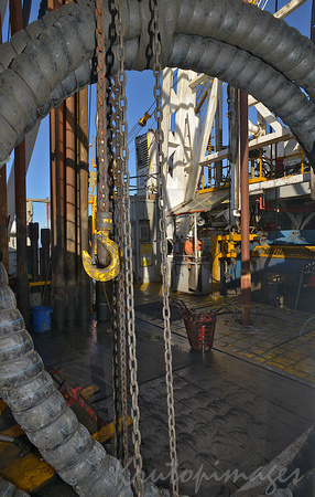 Drill floor through rubber pipe on the main deck of an offshore production platform in Bass Strait_9696
