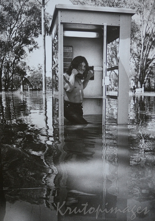 Murray floods -Corowa phone booth in the main street-climate change, or cyclical?
