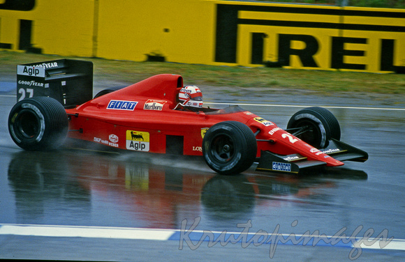 Nigel Mansell  moves around the track during a very wet Adelaide Grand Prix 1990