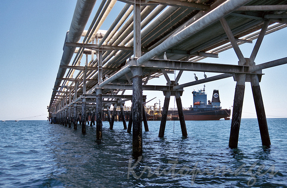 Adelaide refinery pipe carrying bridge to vessels being unloaded