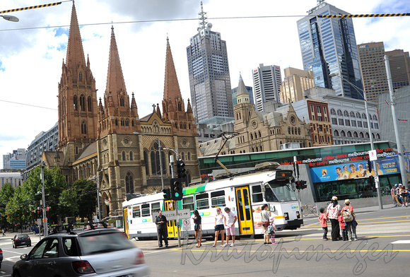 Tram stop on Swanston street Melbourne 2012 -St Pauls cathedral backdrop