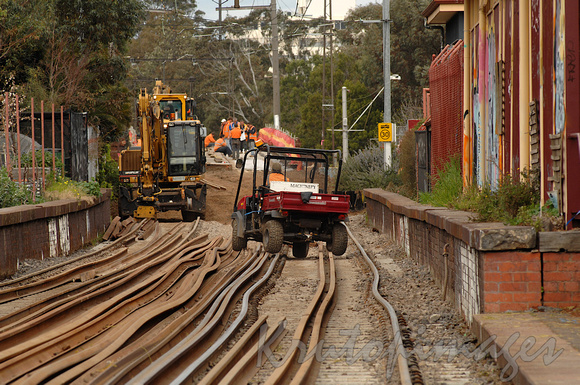 Rail line upgrades in Middle Park Melbourne-a rugged terrain vehicle travels the tracks