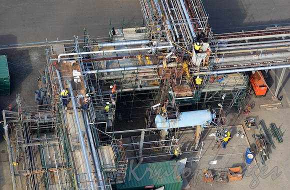 Construction site aerial showing activity of workers on build