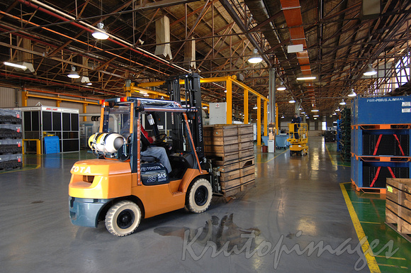forklifts at work on factory floor-2