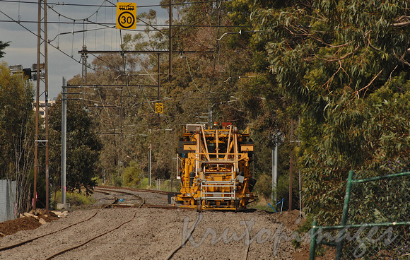 Track upgrades in Melbourne...showing a line shaping and levelling vehiclwe at work