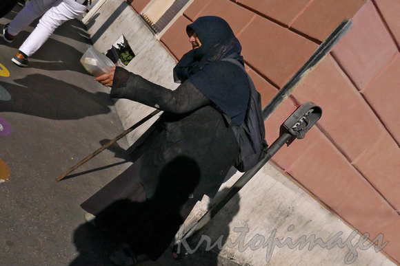 Italy, Rome-Colosseum, & surrounds..street beggar.