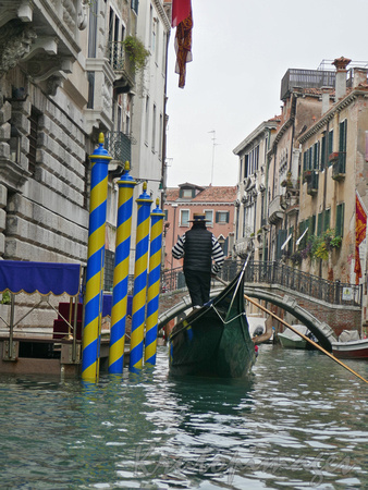 Venice, gondolier in action.