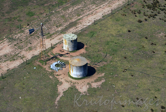 Drought-water tanks on dry property during drought in Victoria
