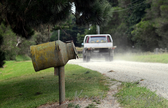 Country road with mailbox created from old milk container-Victoria