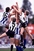 AFL-Collingwood vs Nth Melb 1990 Morwood contests the ball with