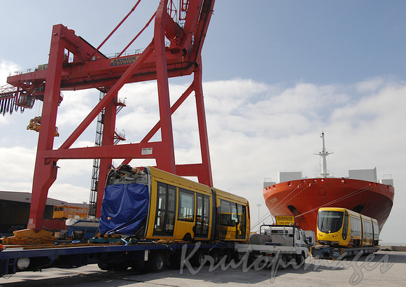 New articulated tram made in France arrives at Web Dock on huge carrier vessel called Texas-2
