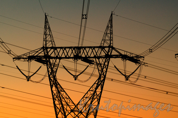 Transmission tower Casey at sunset