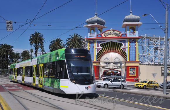 Melbourne public transport tram passes Luna Park in St Kilda