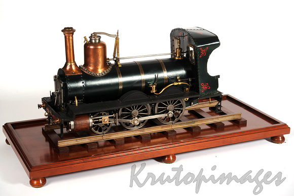 Large copper and painted metal steam train