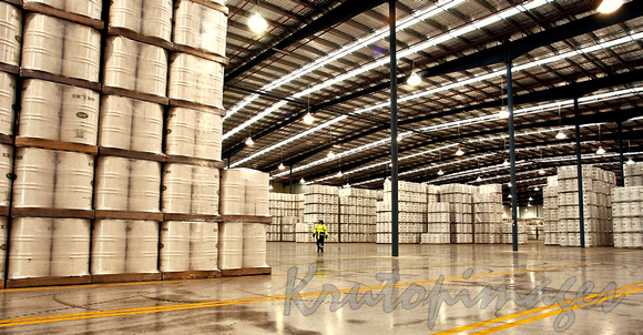 Huge warehouse -shelf storage of drums of powered milk for export