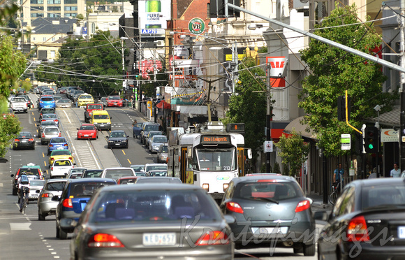 Tram in traffic suburban Melbourne