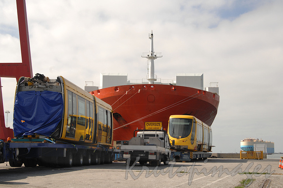 New articulated tram made in France arrives at Web Dock on huge carrier vessel called Texas-3
