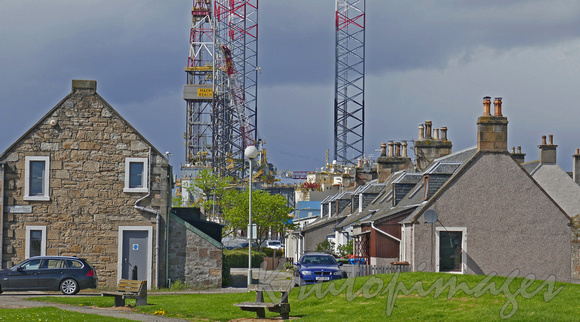 Invergordon houses and offshore rigs backdrop-90779