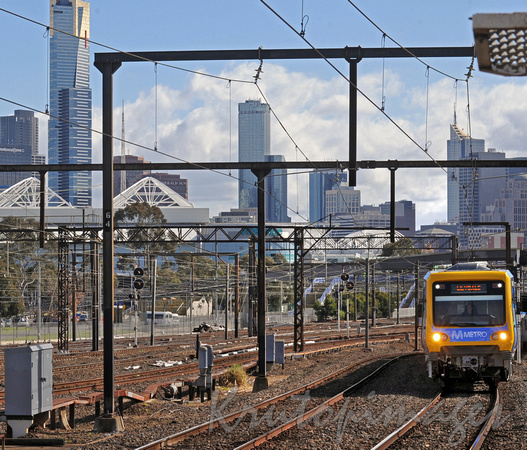 Metro train -PTV leaves MelbourneJollimont for the outer suburbs in the east