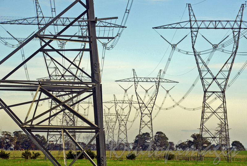 Transmission towers saturate the countryside supplying power to the suburbs-Victoria
