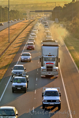 Traffic-Highway home at sunset in Melbourne outer east