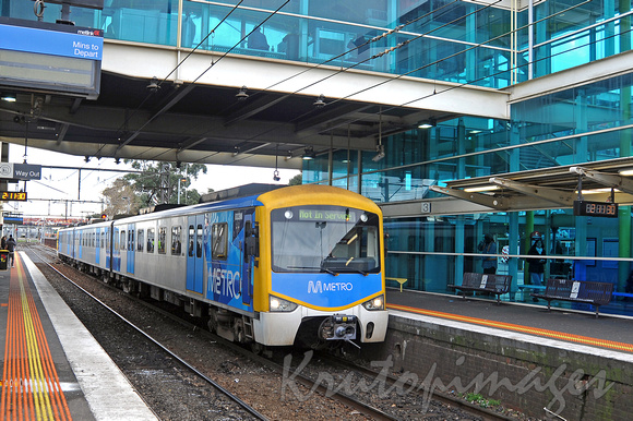 Public Transport Metro train departs Dandenong Railway station