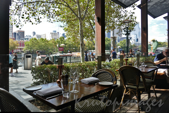 Melbourne Southbank generic streetscape from inside a Yarra River restaurant