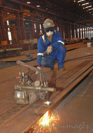 worker cutting steel -Indonesia,Batam Island