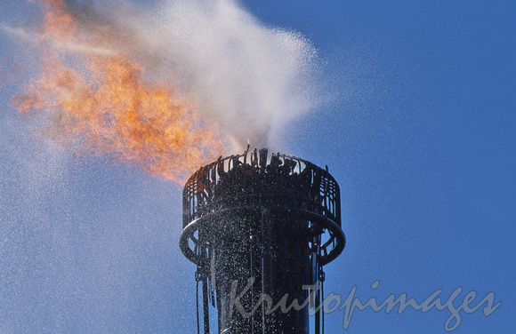 refinery flare -detail burning off excess gases.