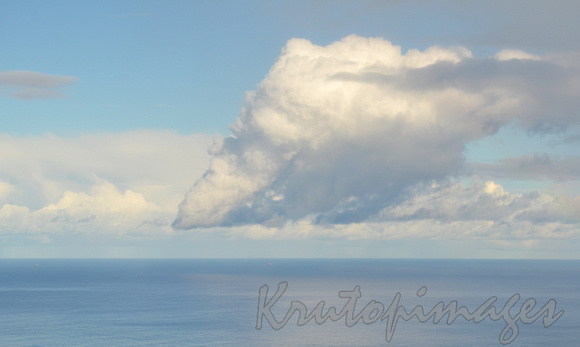 cloud formation over calm sea