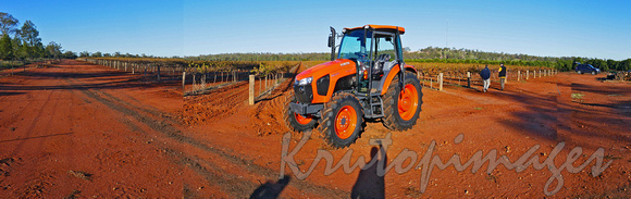 Tractor on Mildura farm with red soil