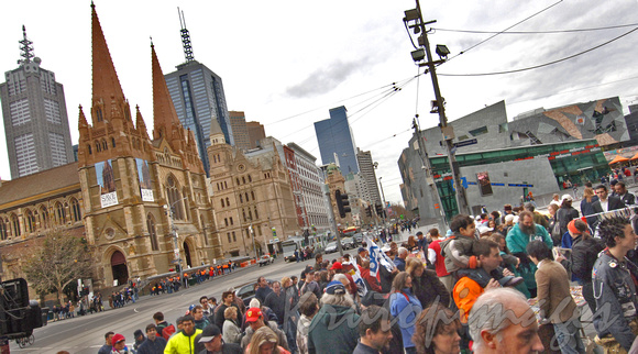 Melbourne crowds outside Flinders Street Station, opposite St Pauls Cathedral