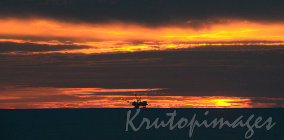 offshore platform at sunset