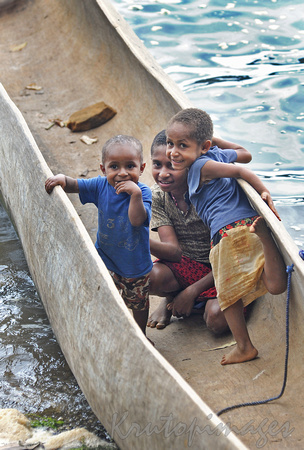 PNG-Tugiri village local children in their family dugout