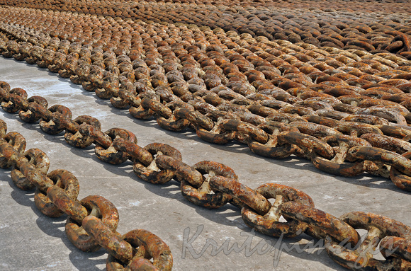heavy duty chains lying on wharf