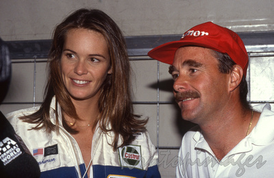 Elle McPherson celebrity driver with F1 driver Nigel Mansel at AGP 91